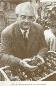 Mads Clausen holding a compressor in 1951