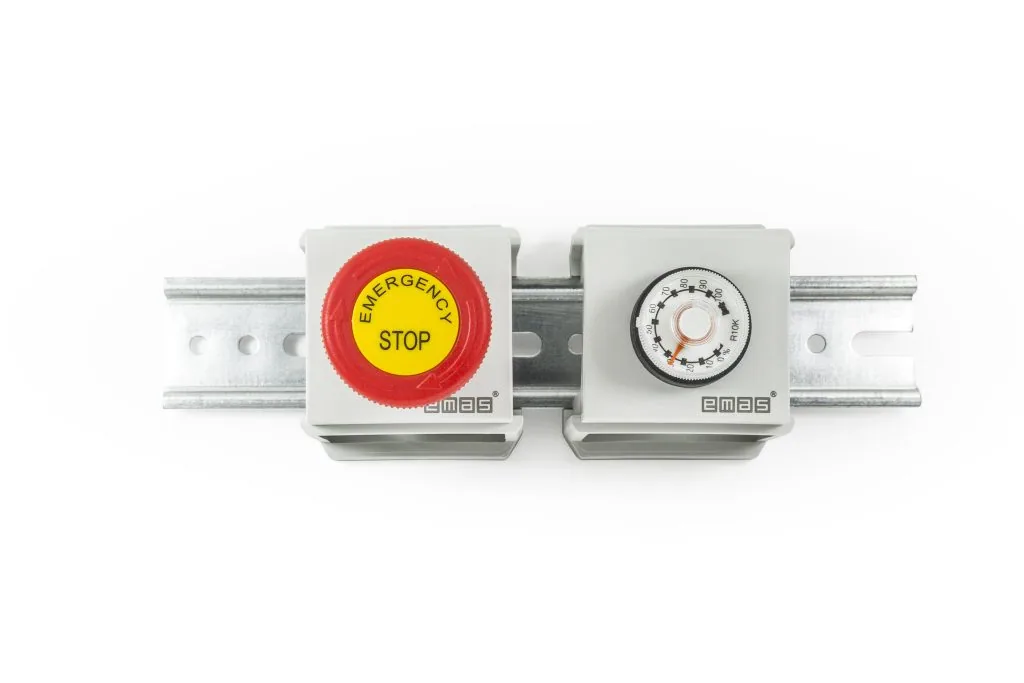 portrait of 2 EMAS BARPS installed on a din rail - adapting an emergency stop button and a potentiometer - available now from LED Controls