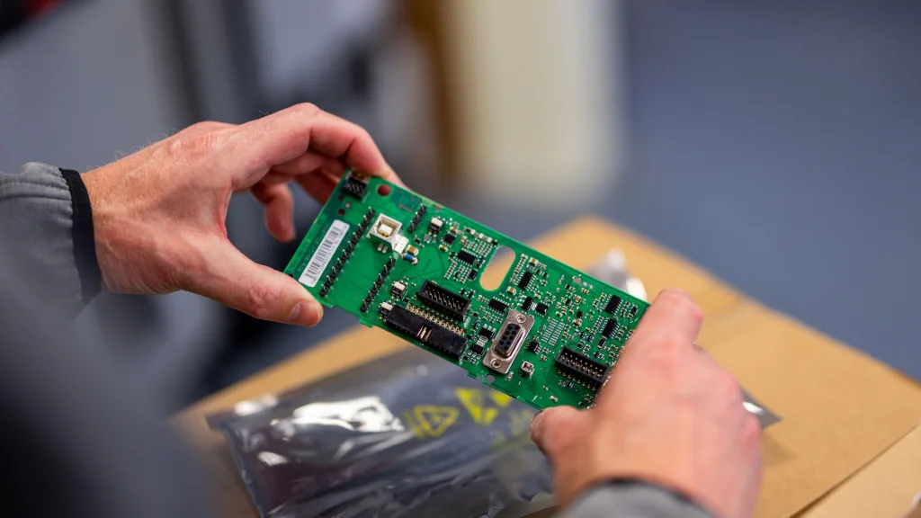 Danfoss Drives DrivePro representatives handling replacement parts. Maintenance, Repair and Operations (MRO) plans available from LED Controls.