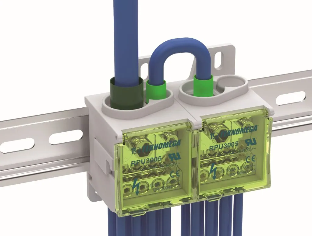 Two Teknomega distribution blocks on a din rail
