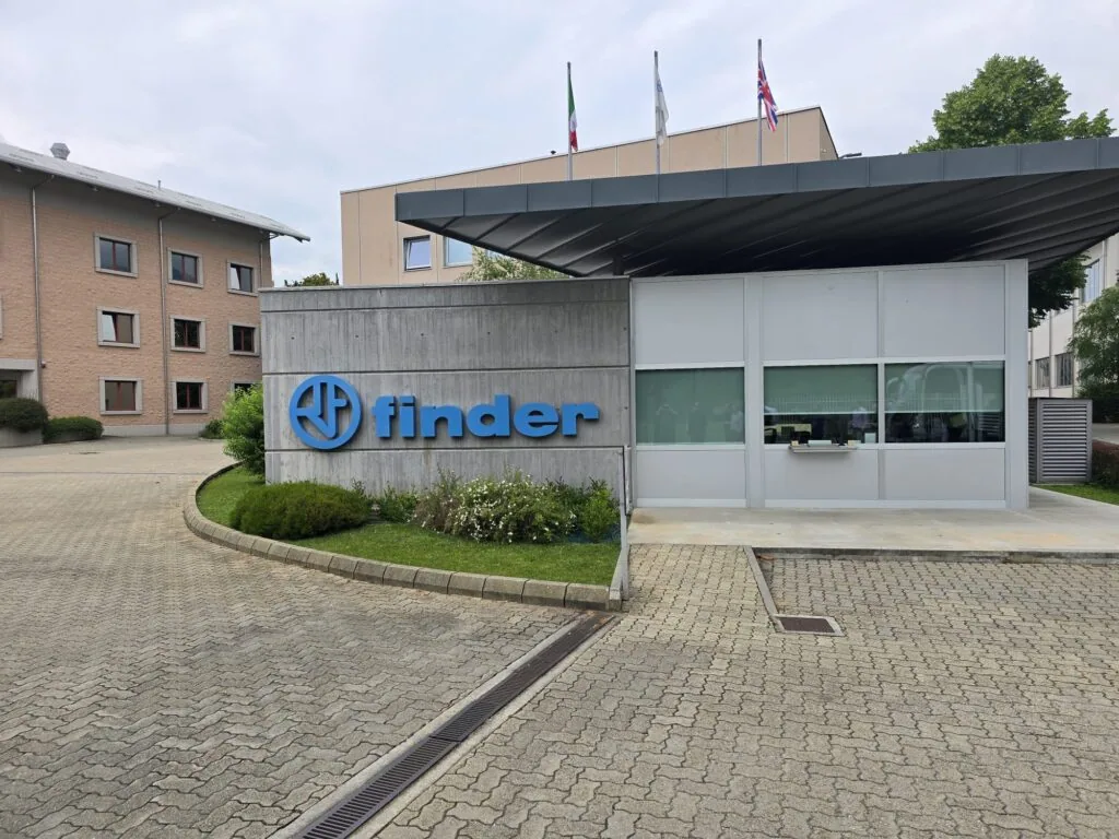 The Finder logo on the exterior of the factory