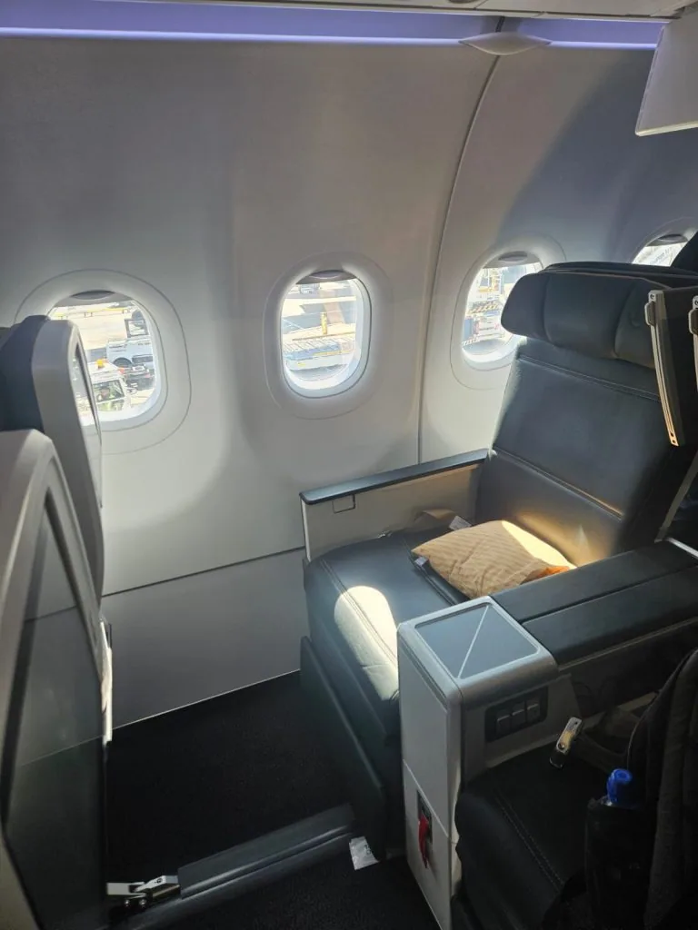 Business class seating onboard a passenger jet