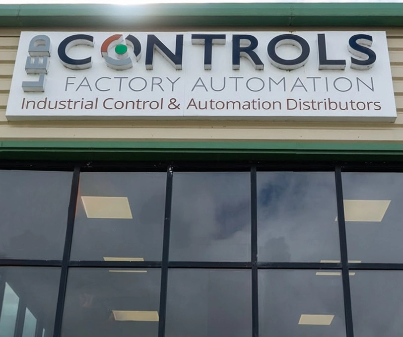 LED Controls Ltd Building Front Front of LED Controls Ltd building with company logo above the glass entrance